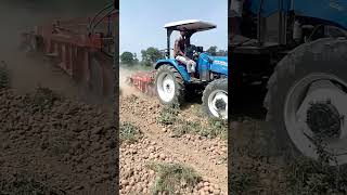 New Holland 6510  New Holland 6510 aalu khodne ki machine ke sath [upl. by Naaman]