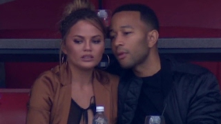 Chrissy Teigen Suffers Wardrobe Malfunction At Super Bowl 51 amp Gives PRICELESS Reaction [upl. by Falcone]