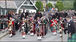 Drum Majors lead the massed Pipes and Drums on the march to 2022 Braemar Gathering in Scotland [upl. by Aneeg]