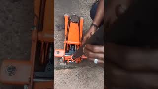 Trolley jack release mechanism lubrication process autotools automotivetools automobile [upl. by Yahsram]