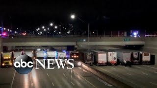 Trucks line up to help stop suicide attempt on Michigan freeway [upl. by Hamimej]