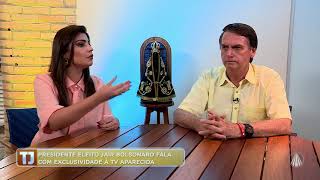 Sou católico e não vou acabar com o feriado de 12 de Outubro diz Bolsonaro em entrevista [upl. by Atiniuq]