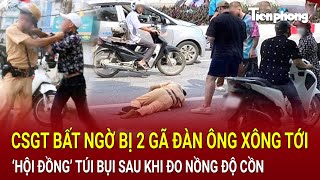 Bản tin thời sự CSGT bất ngờ bị 2 gã đàn ông xông tới ‘hội đồng’ túi bụi sau khi thổi nồng độ cồn [upl. by Delwyn]