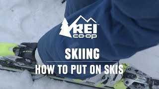 How to Put on Skis  REI [upl. by Nnylyram]