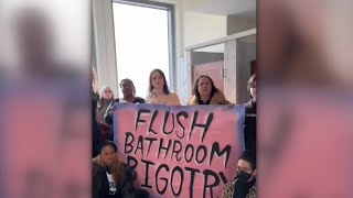 ‘Bullying tactics’ Transgender activists storm women’s bathroom to protest [upl. by Geraldine]