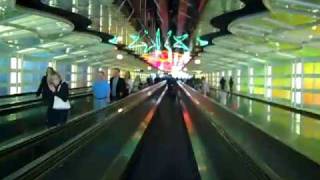 Chicago OHare Airport Tunnel from United Concourse B to C [upl. by Eadnus208]