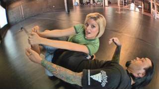 Eddie Bravo shows the Vaporizer leg lock on Joanne of MMA Girls [upl. by Erdnuaed337]