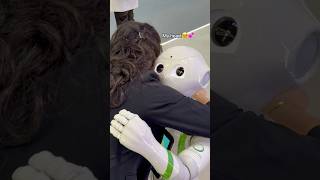 Cutest robot hug in Gitex robot gitexdubi gitexglobal dubai dubailife tesla [upl. by Nema607]