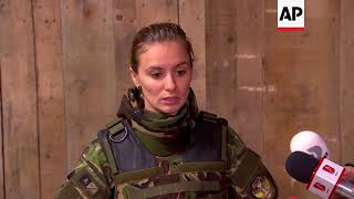 Romanian army introduces new flak jacket for women [upl. by Groh]