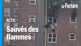 New York  deux adolescents échappent à un incendie en se suspendant dans le vide [upl. by Dorotea179]