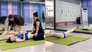 Teachers help girls with stretching exercisesLeg Splits Training [upl. by Rafiq]