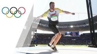 Germanys Harting wins Discus gold [upl. by Jamison]