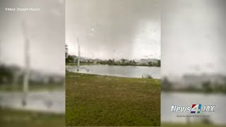 CAUGHT ON CAMERA Tornado seen tearing through subdivision near World Golf Village [upl. by Rosalinde485]