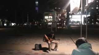 Guitarist virtuoso playing in a Tokyo park MASKROID [upl. by Ynove640]