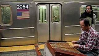 Yangqin Player in NYC Subway [upl. by Lahcear]