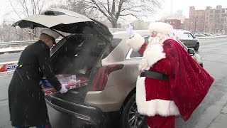 Santa Claus assisted in the Stuff the Bus campaign in Scranton [upl. by Yenobe]