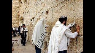 A Jewish prayer at the Western Wall Wailing Wall Jerusalem Israel [upl. by Arley671]