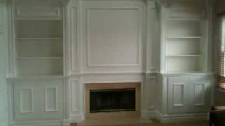 Fireplace mantel with surrounding builtins all created by CarpentryMastersco [upl. by Htebi]