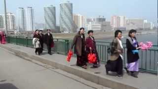 Driving across bridge from Yanggakdo International Hotel  North Korea DPRK April 2012 [upl. by Gothart]