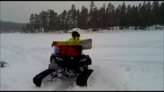 Suzuki King quad 750 4x4 ATV with Camoplast tatou 4s snow tracks kit belter 4 four wheeler [upl. by Renata]