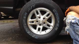 2003 Jeep Grand Cherokee Laredo How To Remove Tire Rear Passenger Side [upl. by Ahtelat315]