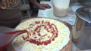 Frank Giaquinto Master PIzza Maker Opening a NY style dough ball with oil Part 1 [upl. by Elletnahc]