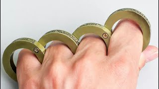 Folding self defense brass knuckle rings [upl. by Einad]