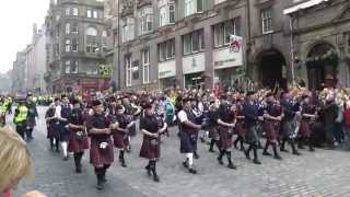 Massed Pipes amp Drums on Edinburghs Royal Mile [upl. by Mcclain]