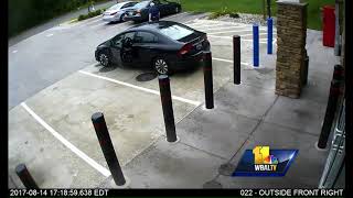 Surveillance video shows suspect stealing car with boy inside [upl. by Rammus]