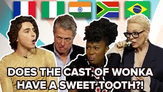 The Cast Of Wonka Try Sweets from Around The World [upl. by Sothena]