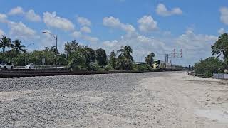 Brightline northbound across the Jupiter Drawbridge over the Loxahatchee River [upl. by Almita215]