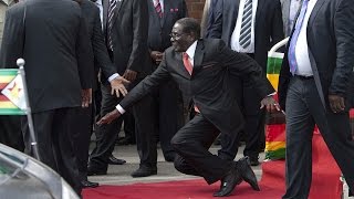 WATCH Robert Mugabe falls down steps in Harare [upl. by Idel]