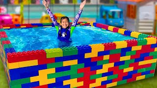 Jannie Teaches Ellie How to Swim in the Kids Pool and Plays with Fun Water Toys [upl. by Calmas]