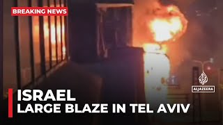 Large blaze in Tel Aviv after raid sirens sound [upl. by Yendroc]