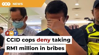 Senior CCID cops deny taking RM1 million in bribes [upl. by Lisabeth]