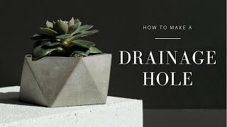 How to Make a Drainage Hole in a Concrete Planter Using a Drill [upl. by Regdor]