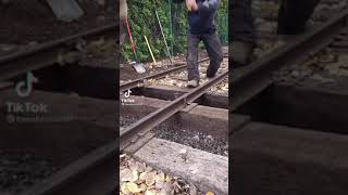 Guys hammering railroad track makes a sick beat shorts [upl. by Oinoitna]