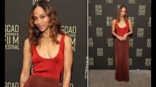 Zoe Saldana goes braless in a plunging red hot dress at 27th SCAD Savannah Film Festival [upl. by Qooraf]