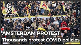 Thousands protest against Dutch COVID restrictions [upl. by Anuayek]