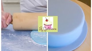 come coprire una torta con la pasta di zucchero  How to Cover a cake with Fondant parte 1 [upl. by Tavi237]