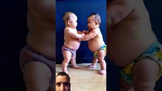 Two Babies Fight Attack Doesnt Show Wind 🤣  baby shorts fighting reaction ytshorts funny [upl. by Ldnek580]