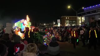 Santa Claus arrives in Cedar Falls on a rocking horse at 15th Holiday Hoopla in 2023 [upl. by Nosirrag]