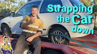 Strapping a Car down on the car trailer just a small tip that might help you out [upl. by Hentrich]