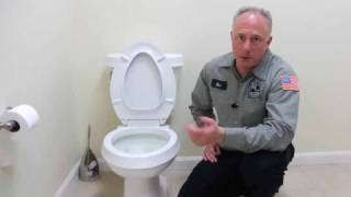 How to Fix a Clogged Toilet  Plumbing Repairs [upl. by Mylan]