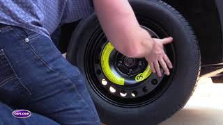 How to Change a Tire A StepbyStep Guide— Carscom [upl. by Nagoh346]