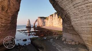 Falaises dEtretat à travers la Manneporte  Drone 4K  FRANCE [upl. by Arracahs]