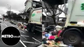 Moment bin lorry dumps its load on London street  Metrocouk [upl. by Haman]