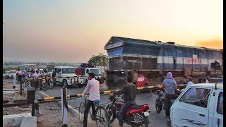 Diesel Trains at Level Crossing  Indian Railways [upl. by Enyalaj]