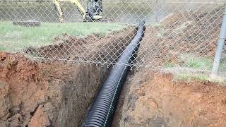 Installing And Backfilling Drain Pipe [upl. by Akemahc]