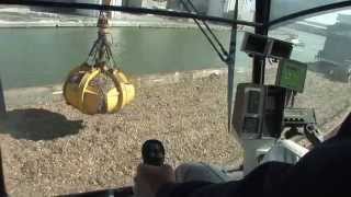 SENNEBOGEN  Port Handling 870 Material Handler with biomass grab in Port of Tilbury Great Britain [upl. by Nylemaj]